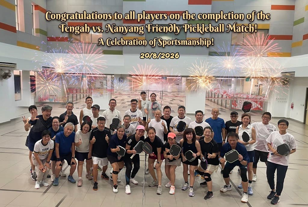 Team Tengah and Nanyang CC players pose together for a group photo, paddles in hand, after their 20 August friendly match.